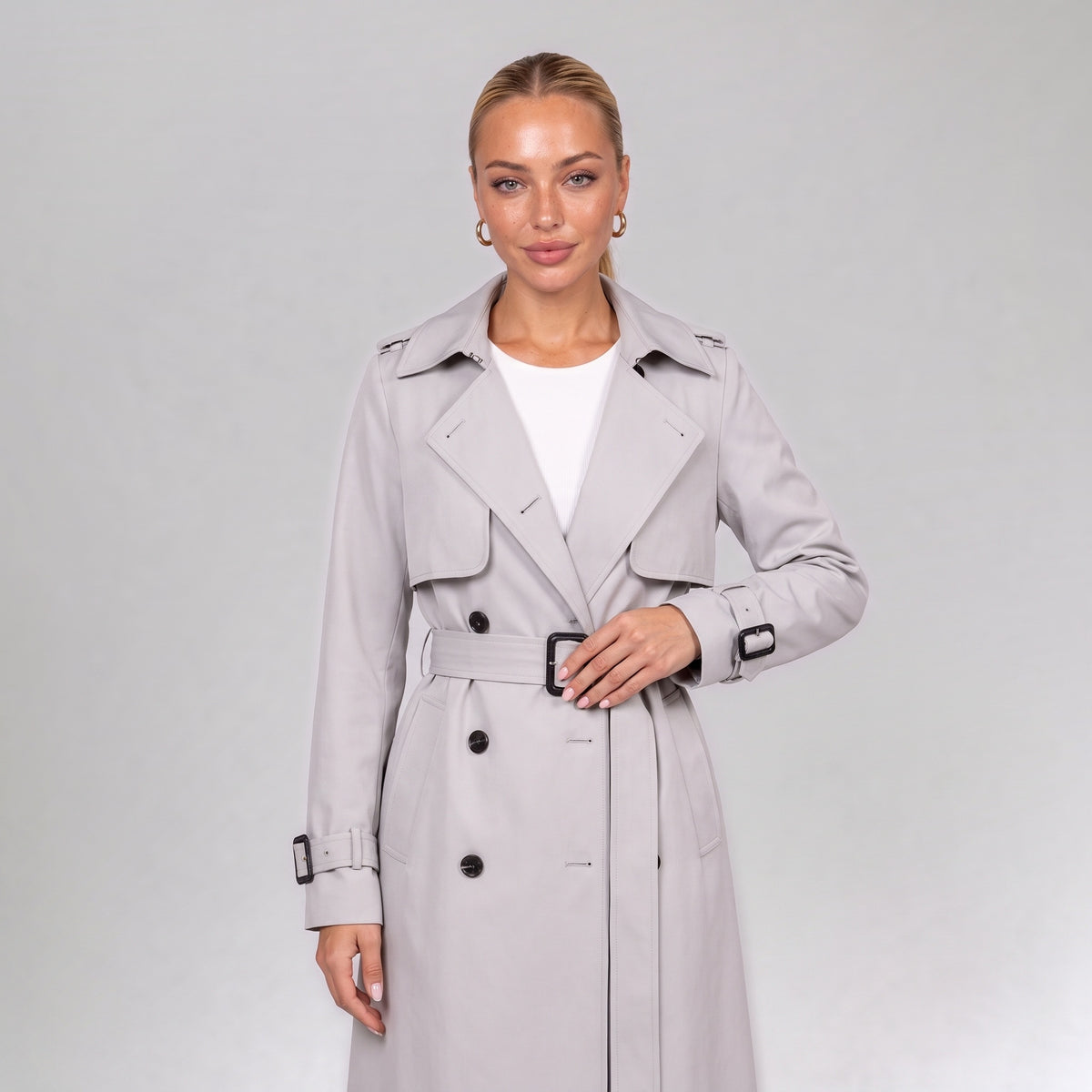 Close up of the off white double breasted trench coat with belt