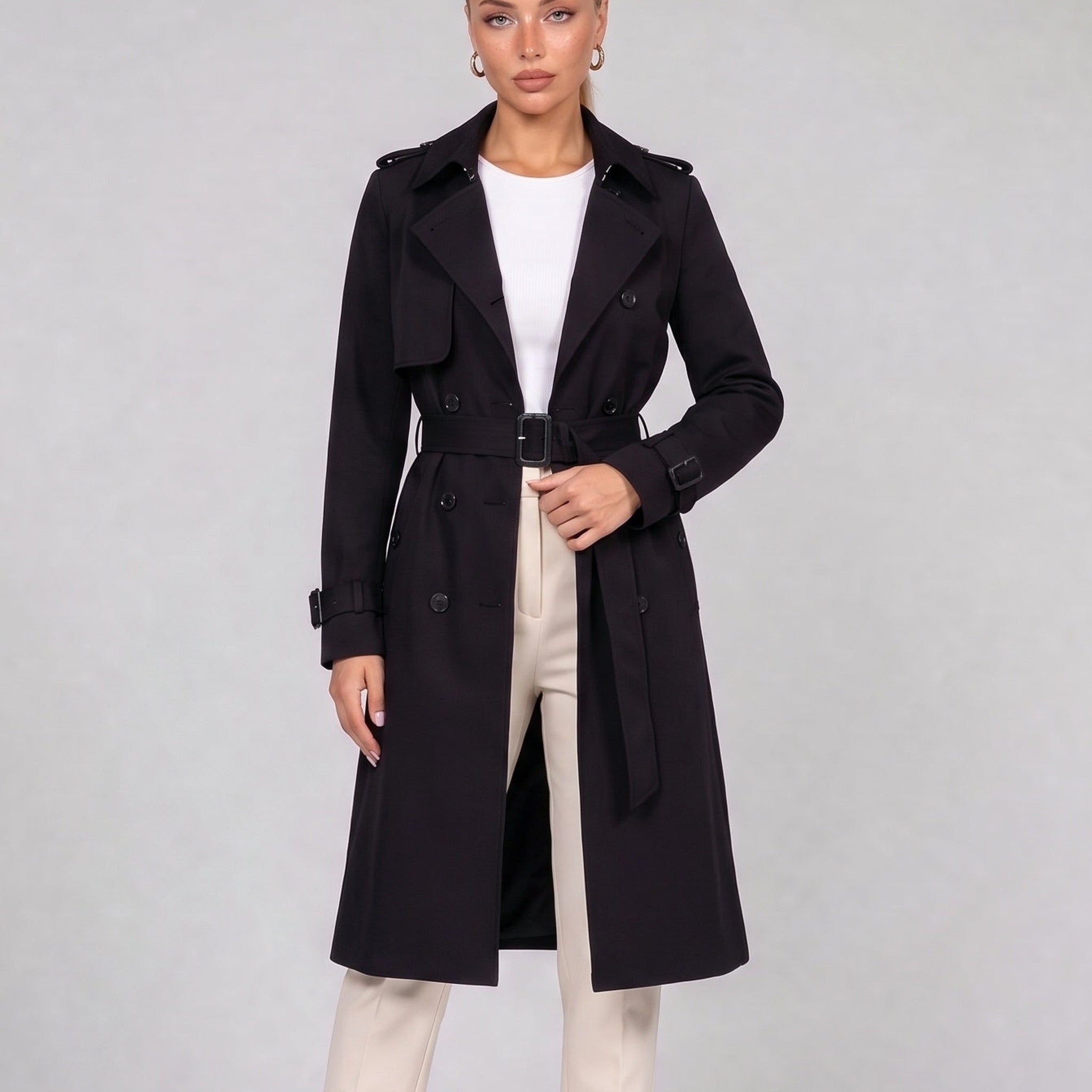 Black double breasted trench coat with belt, front view on model