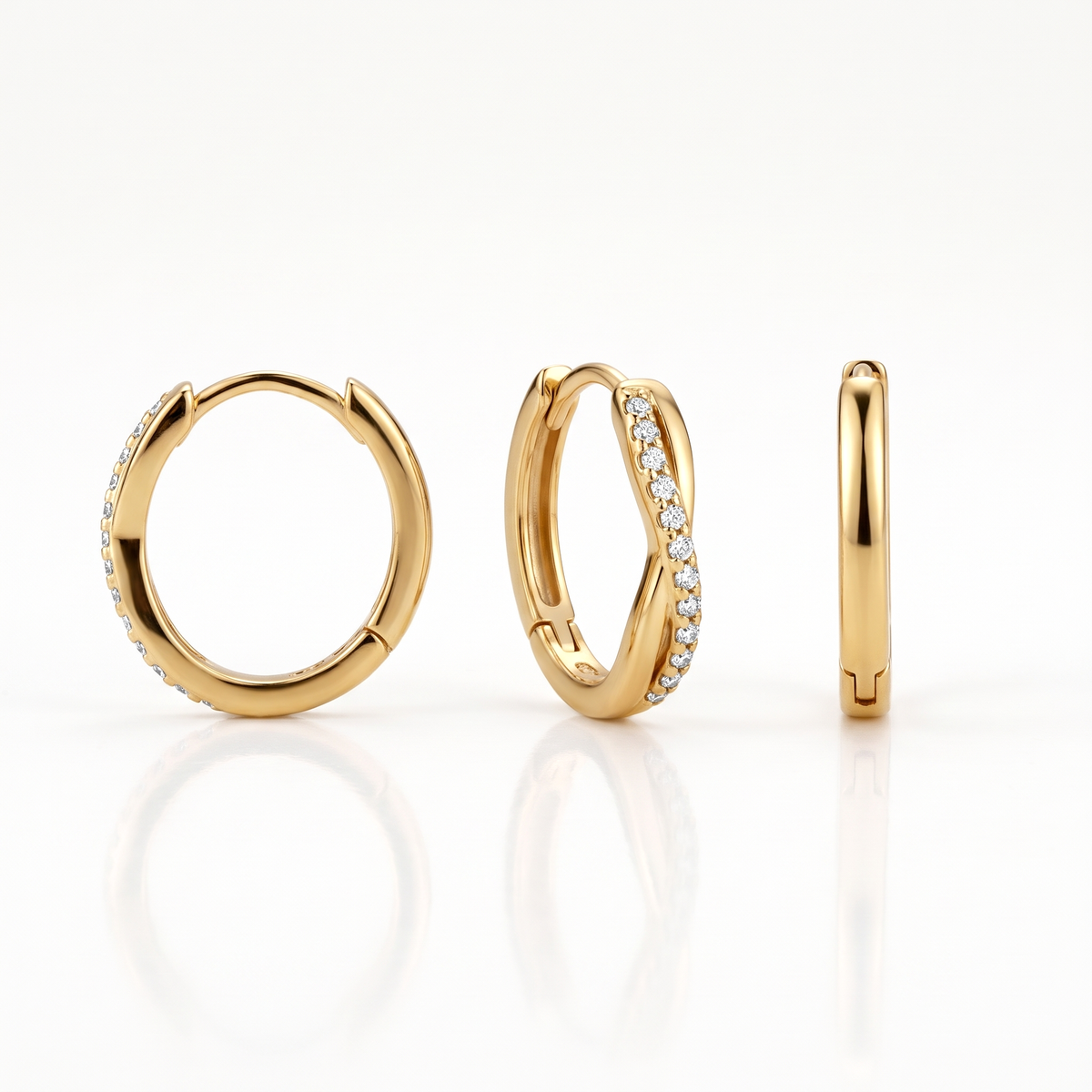 Gold-tone twisted crystal huggie hoop earring shown from the front, at an angle and from the side