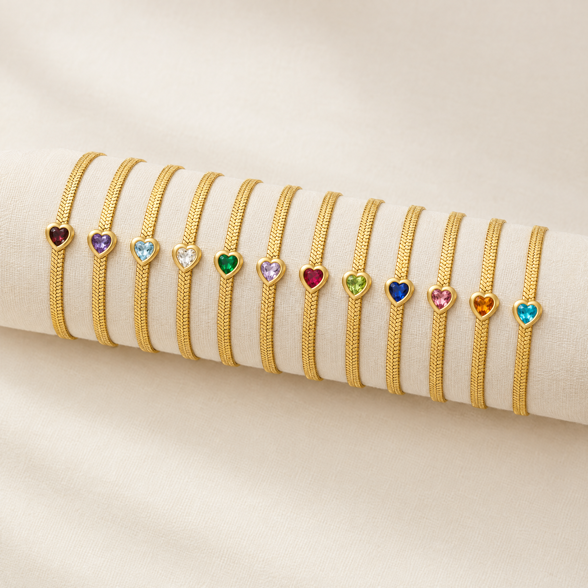 Twelve heart birthstone snake chain bracelets, one for each month
