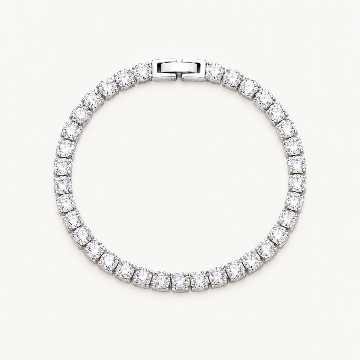Silver-tone tennis bracelet with a single row of round cubic zirconia stones