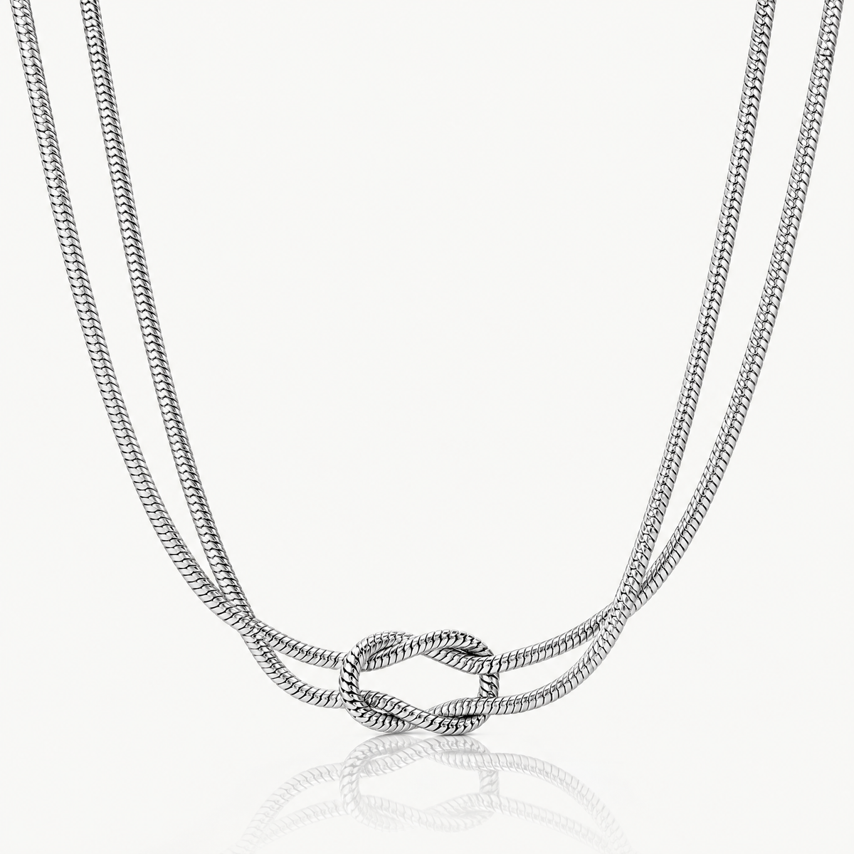 Silver-tone knot necklace with a double snake chain