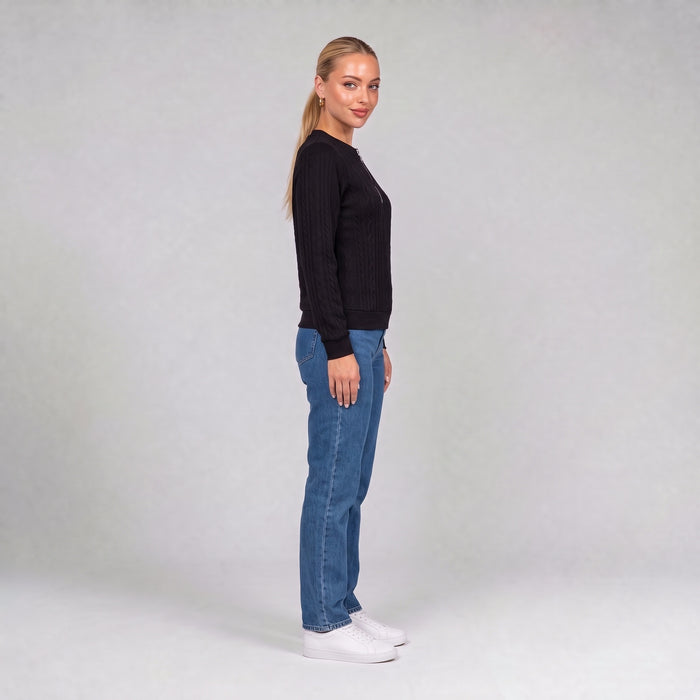 Black quarter zip cable knit jumper, side view on model