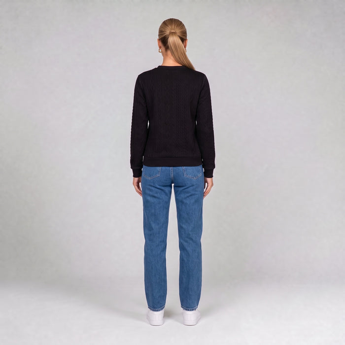 Black quarter zip cable knit jumper, back view on model